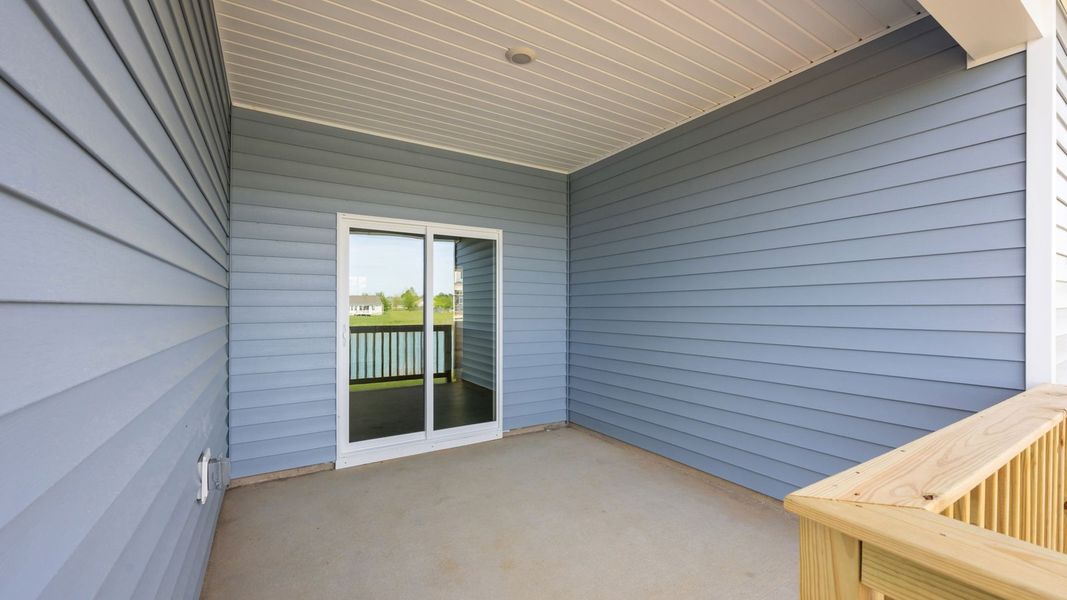 Exterior details and patio area of a home in Tyler - Home on the Lake, New Bern (Image 25).