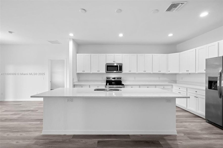 Furnished interior view inside a new home in , Cape Coral (Image 3). Furnished interior view inside a new home in , Cape Coral (Image 3).