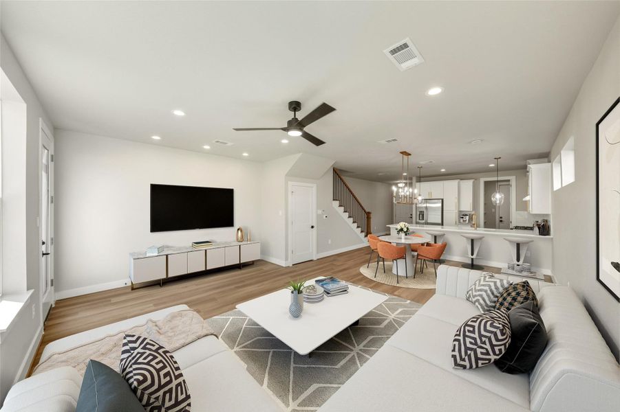 Experience seamless entertaining in this open-concept living room, perfectly connecting the kitchen and backyard BBQ area for effortless hosting.Virtually staged Experience seamless entertaining in this open-concept living room, perfectly connecting the kitchen and backyard BBQ area for effortless hosting.Virtually staged