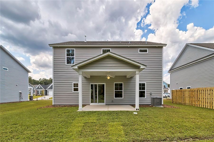 This residence features a covered patio perfect fo