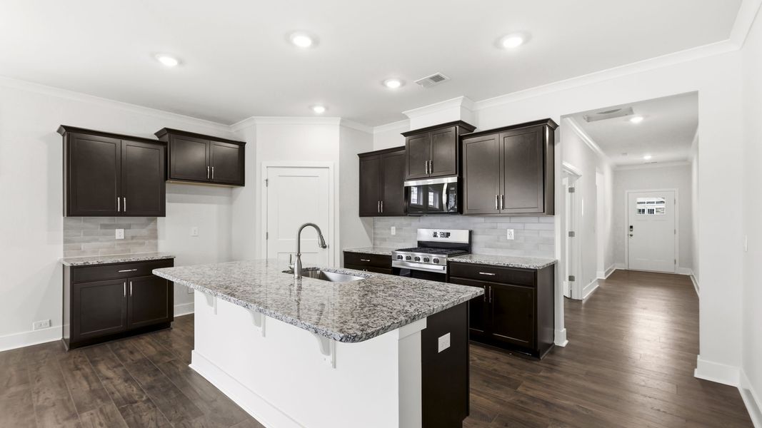 Furnished interior view inside a new home in Reserve at Tap Root Farms, Fletcher (Image 4). Furnished interior view inside a new home in Reserve at Tap Root Farms, Fletcher (Image 4).