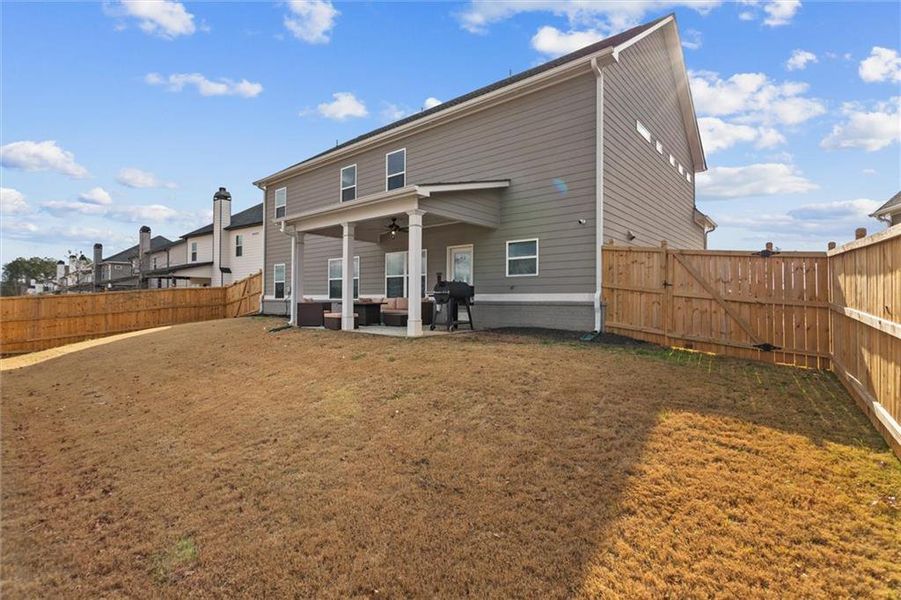 Exterior details and patio area of a home in Enclave at Brookside Crossing, Auburn (Image 4).