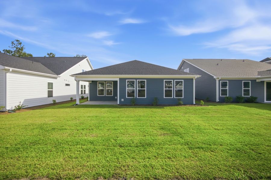 Exterior details and patio area of a home in Terrapin, Leland (Image 15).