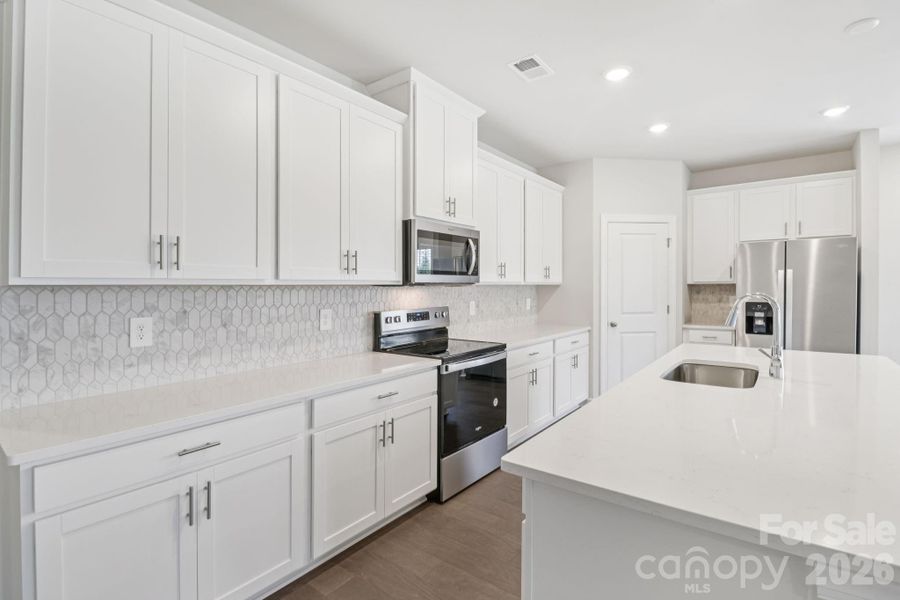 Photo is not of the actual home but is an inspirational photo of builder’s model home and may depict options, furnishings, and/or decorator features that are not included