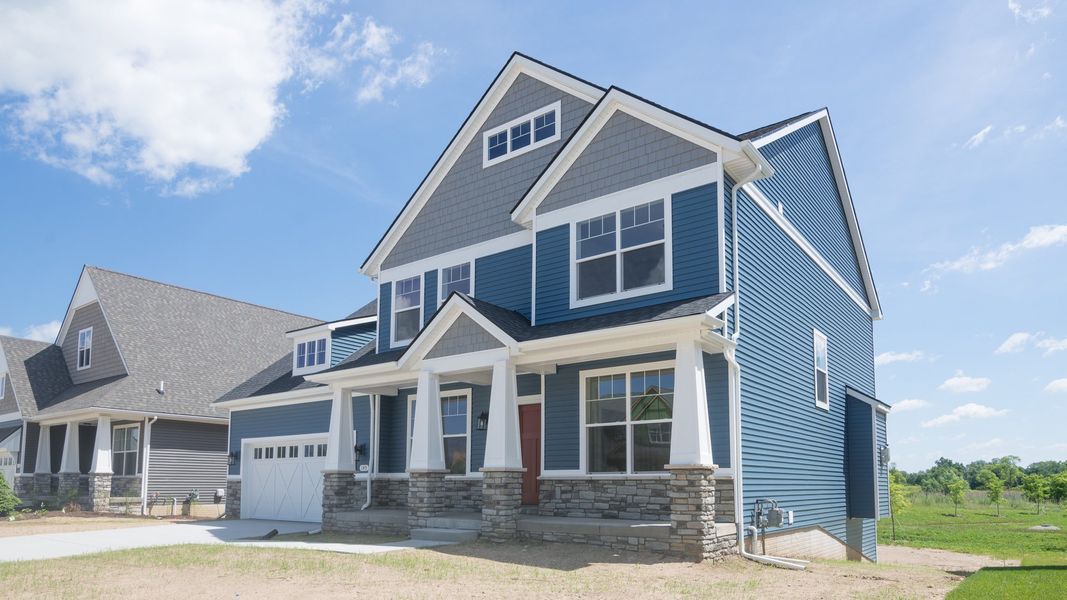 Representative exterior photo of a completed home built from the The Briarhaven III by Norfolk Homes in Coronado Estates, Jackson, MI (Image 28).