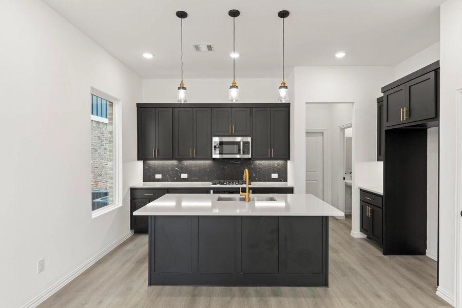 Kitchen featuring the Noir Collection Kitchen featuring the Noir Collection