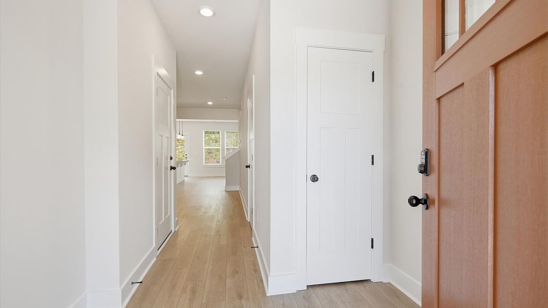 Memorable arrival experience with hardwood floors and elegant trim in the foyer at the Marion Square community Memorable arrival experience with hardwood floors and elegant trim in the foyer at the Marion Square community