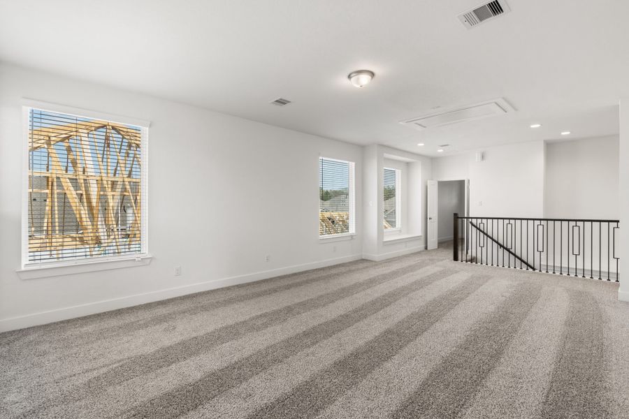 Spacious, unfurnished interior of a new home in The Highlands, Porter (Image 34).