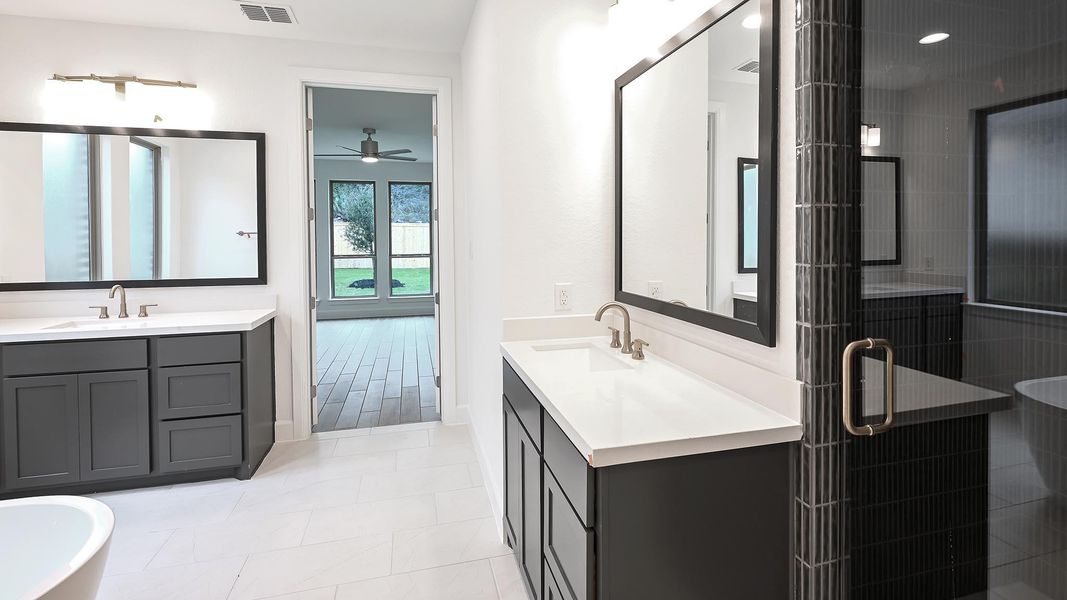 Furnished interior view inside a new home in Hidden Canyon 55', San Antonio (Image 13).