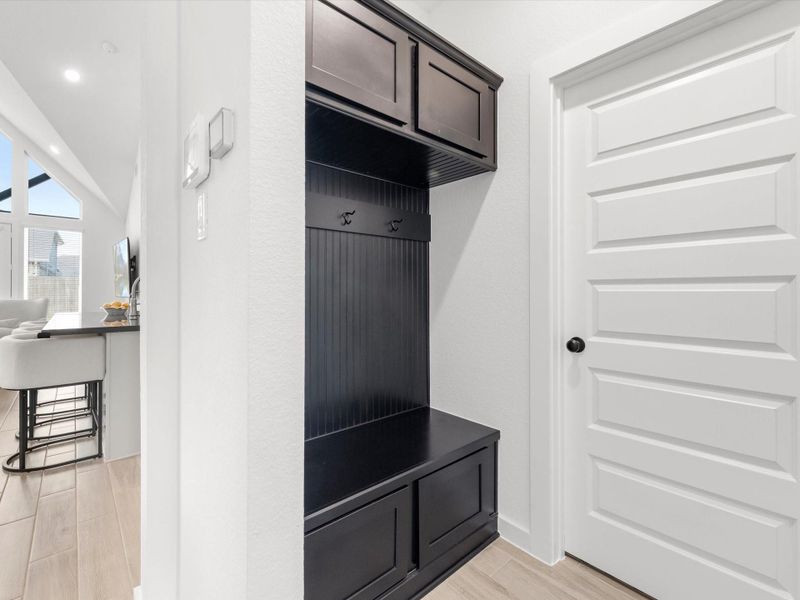 Convenient 'Mud' area to drop off packages, backpacks and jackets when you come in from the garage. Convenient 'Mud' area to drop off packages, backpacks and jackets when you come in from the garage.