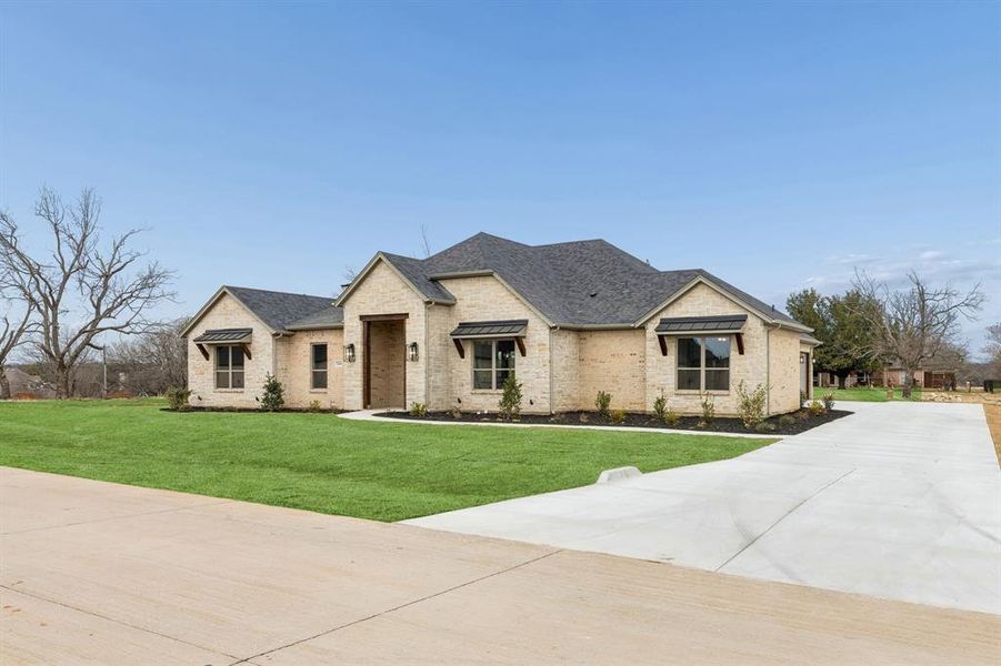 Front exterior of a new home in , Granbury, TX, highlighting curb appeal (Image 21).