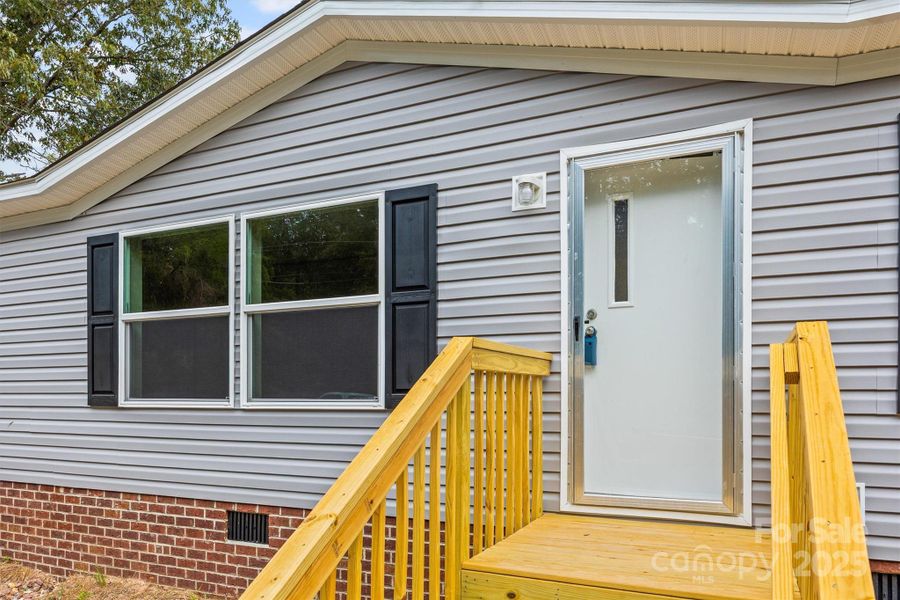 Front exterior of a new home in , Sharon, SC, highlighting curb appeal (Image 12). Front exterior of a new home in , Sharon, SC, highlighting curb appeal (Image 12).