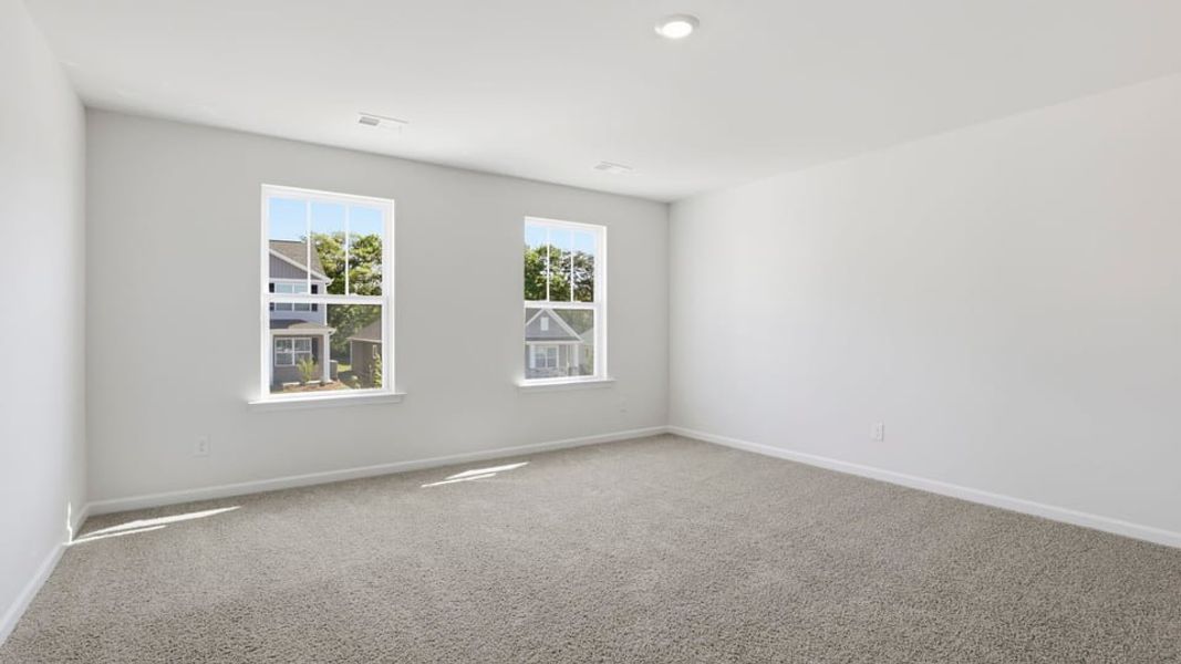 Spacious, unfurnished interior of a new home in Durbin Meadows Traditions, Fountain Inn (Image 33).