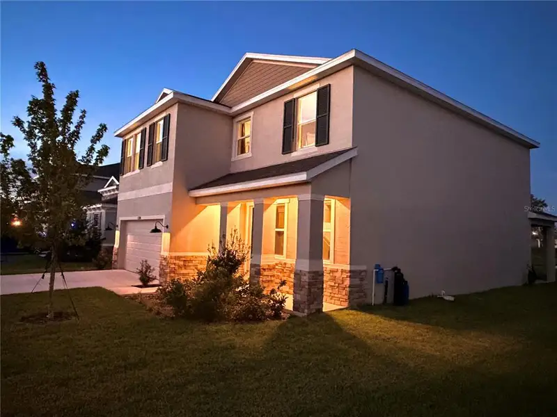 Front exterior of a new home in , San Antonio, FL, highlighting curb appeal (Image 24). Front exterior of a new home in , San Antonio, FL, highlighting curb appeal (Image 24).