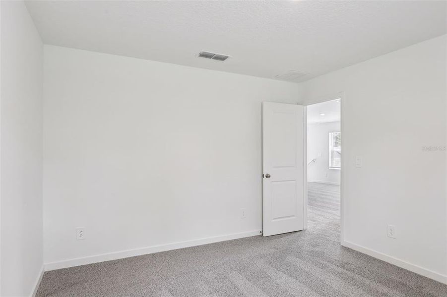 Spacious, unfurnished interior of a new home in Flagler Village - Classic Series, Palm Coast (Image 27). Spacious, unfurnished interior of a new home in Flagler Village - Classic Series, Palm Coast (Image 27).