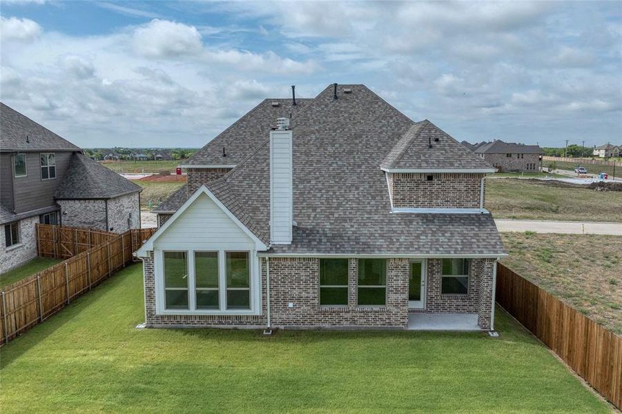 Exterior details and patio area of a home in Stone River Glen, Royse City (Image 3). Exterior details and patio area of a home in Stone River Glen, Royse City (Image 3).