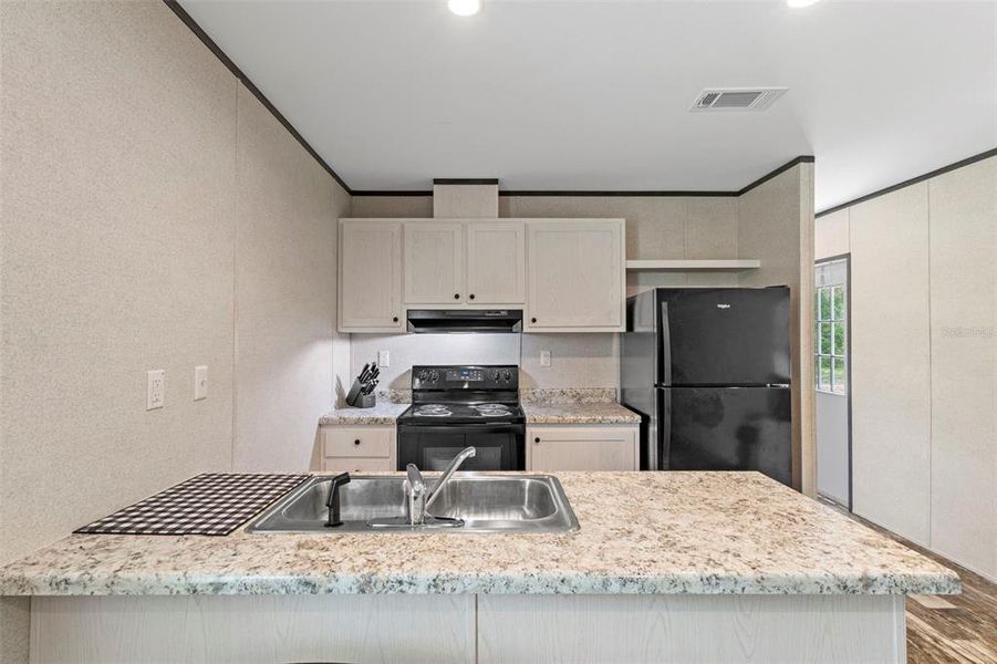 Furnished interior view inside a new home in , Webster (Image 14).