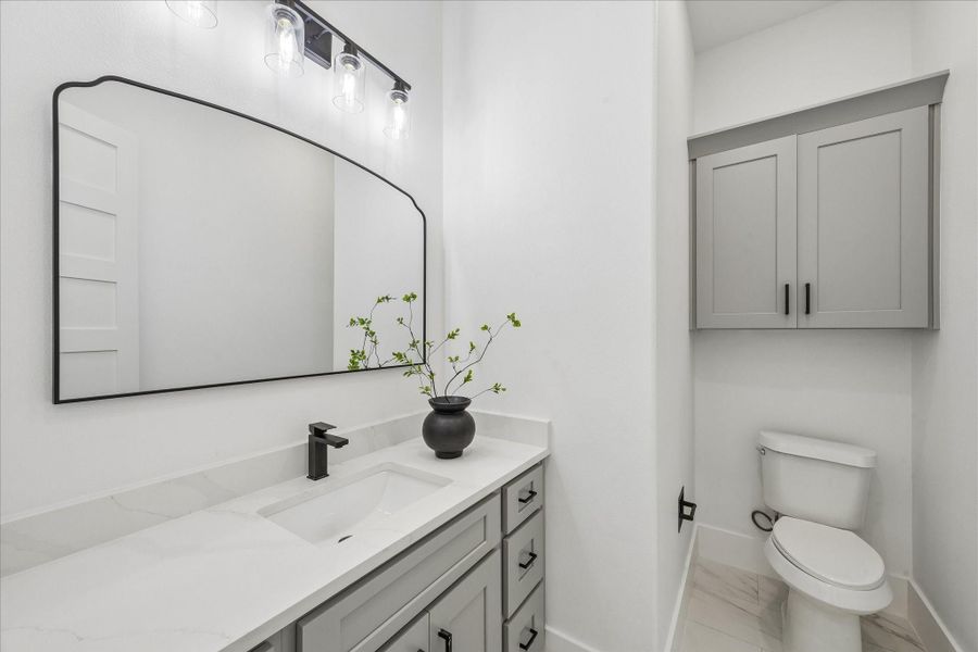 Half Bath upstairs, conveniently located near upstairs game room! Half Bath upstairs, conveniently located near upstairs game room!