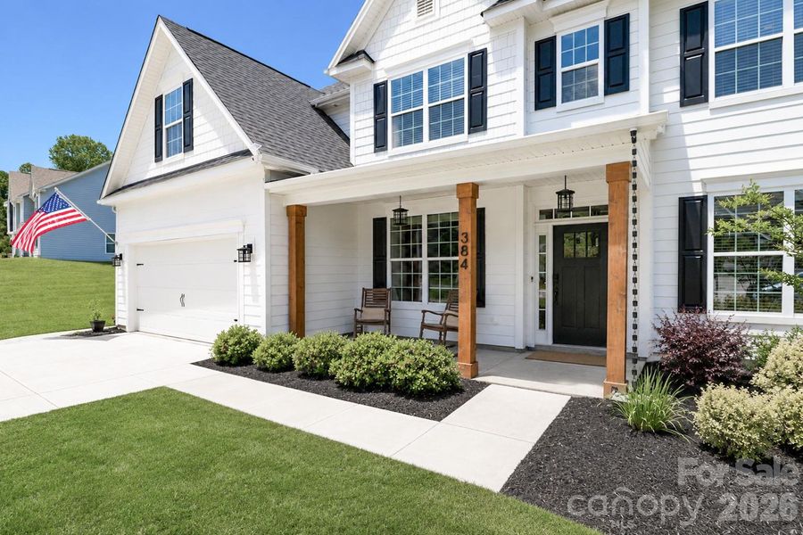 Exterior details and patio area of a home in Falls Cove, Troutman (Image 29).
