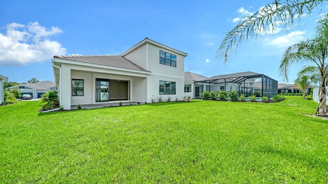 Exterior details and patio area of a home in Windward Real Estate and Homes for Sale in Sarasota, FL - Neal Communities, Lakewood Ranch (Image 27).
