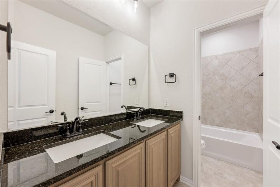 Furnished interior view inside a new home in The Oaks, Red Oak (Image 14). Furnished interior view inside a new home in The Oaks, Red Oak (Image 14).