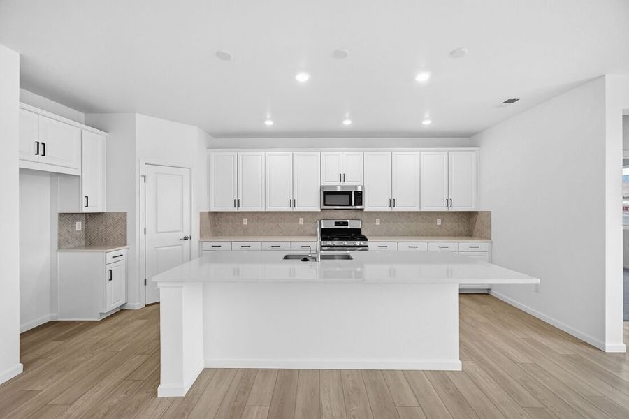 Furnished interior view inside a new home in Trailstone, Arvada (Image 11).