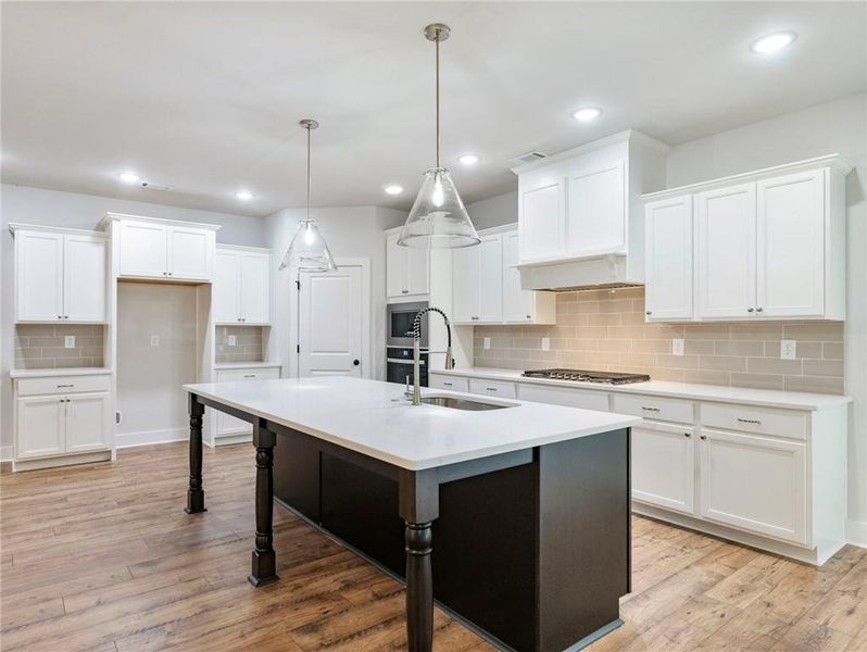 Furnished interior view inside a new home in , Buford (Image 6). Furnished interior view inside a new home in , Buford (Image 6).