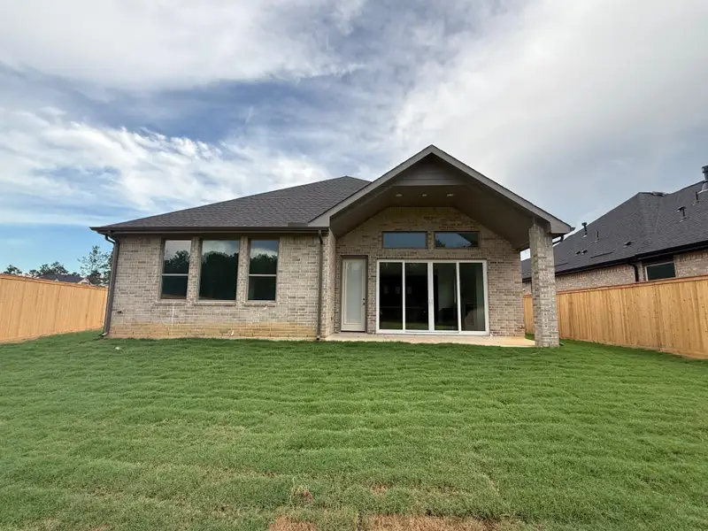 Front exterior of a new home in Kresston, Montgomery, TX, highlighting curb appeal (Image 7). Front exterior of a new home in Kresston, Montgomery, TX, highlighting curb appeal (Image 7).