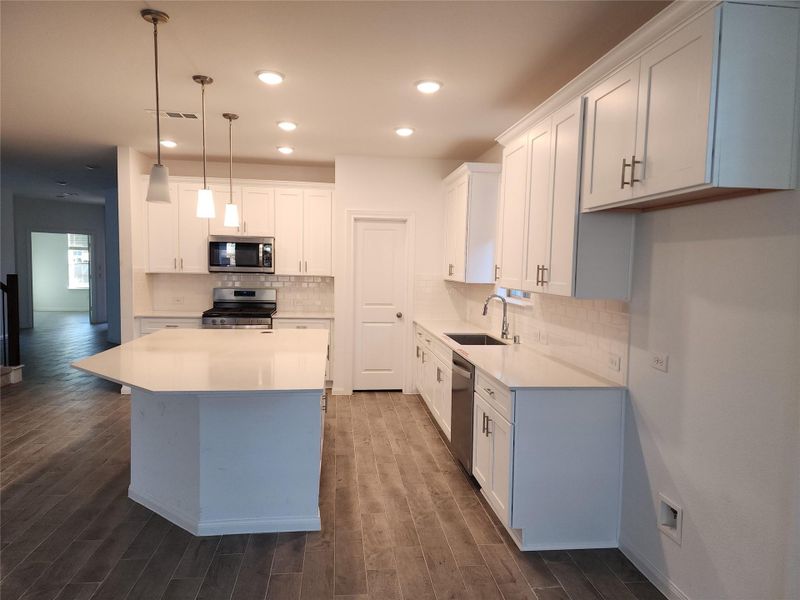 Furnished interior view inside a new home in Rosehill Lake, Magnolia (Image 4).