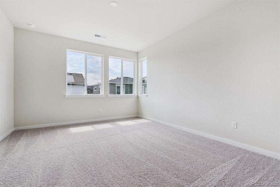 Spacious, unfurnished interior of a new home in Floret Collection at Parkdale Commons, Lafayette (Image 27).