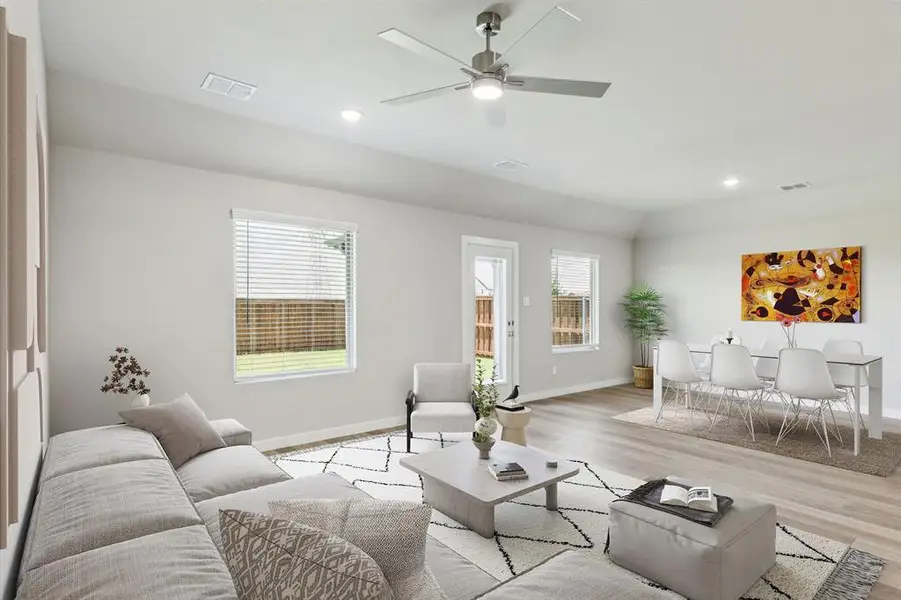 Living Room in the Harper home plan by Trophy Signature Homes – REPRESENTATIVE PHOTO