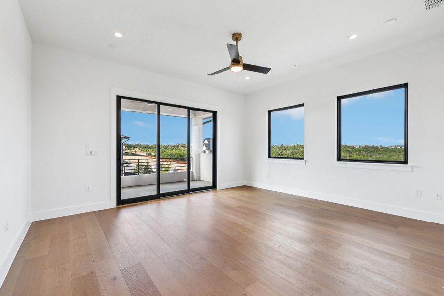Gameroom with light wood-style flooring, recessed lighting, and a ceiling fan