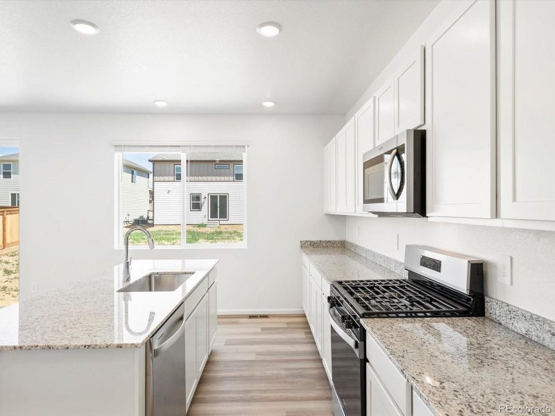 Furnished interior view inside a new home in Revere at Johnstown, Johnstown (Image 4).