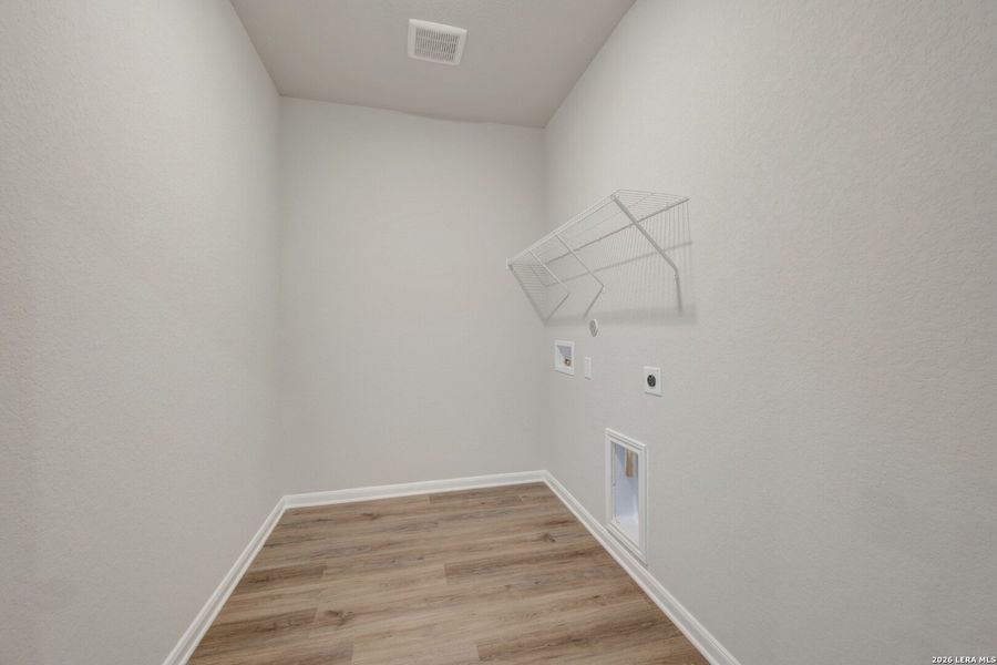 Spacious, unfurnished interior of a new home in Winding Brook, San Antonio (Image 48).
