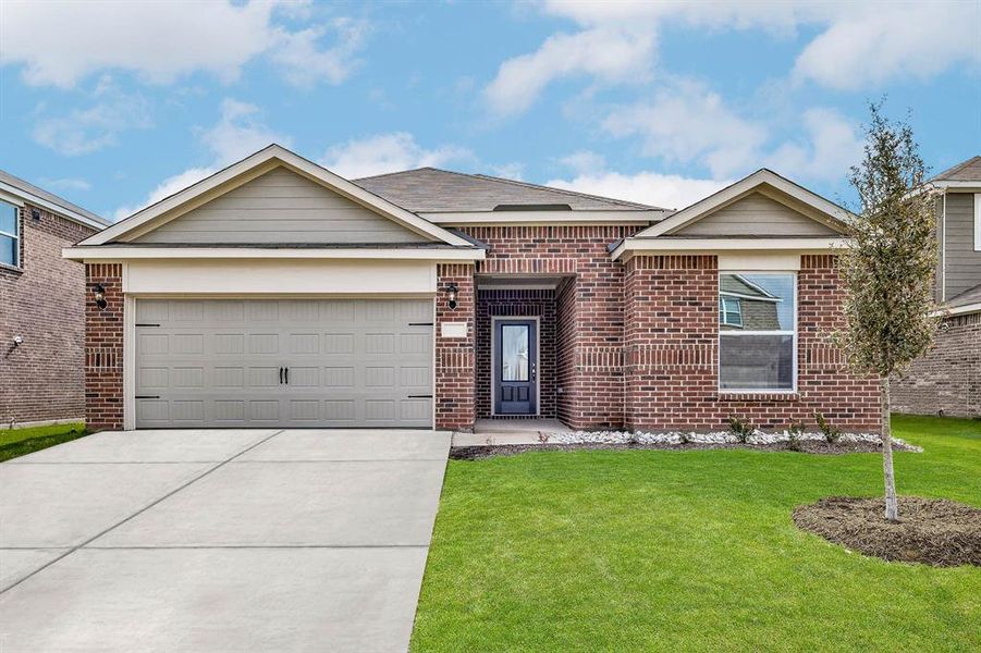 Single story home with a front lawn and a garage