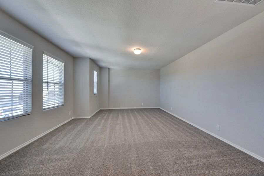 Representative unfurnished interior of a home built from the Devon by Ashton Woods in Cordova Trails, Seguin (Image 23).