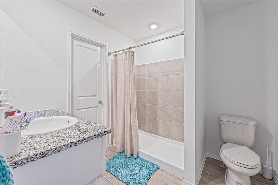 Furnished interior view inside a new home in South Oak Grove: Cottage Collection, Fort Worth (Image 16). Furnished interior view inside a new home in South Oak Grove: Cottage Collection, Fort Worth (Image 16).