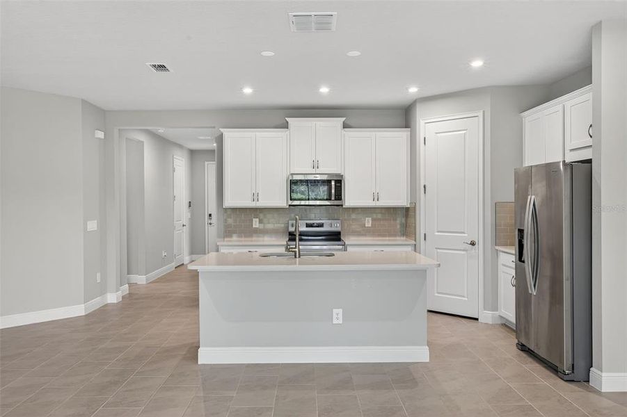 Furnished interior view inside a new home in Windwater, Parrish (Image 7).