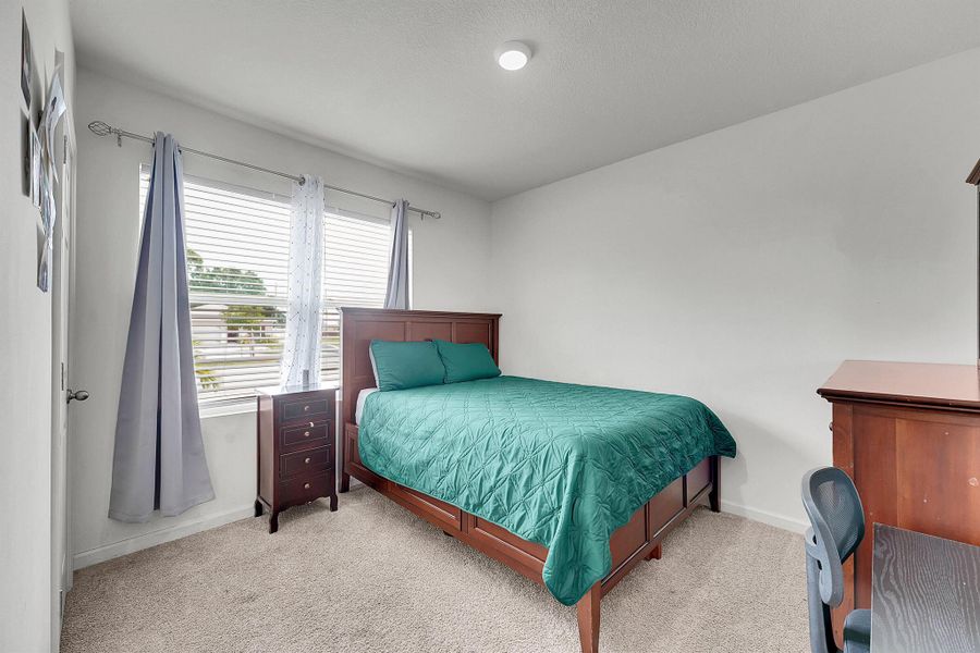 Furnished interior view inside a new home in , Port St. Lucie (Image 6).