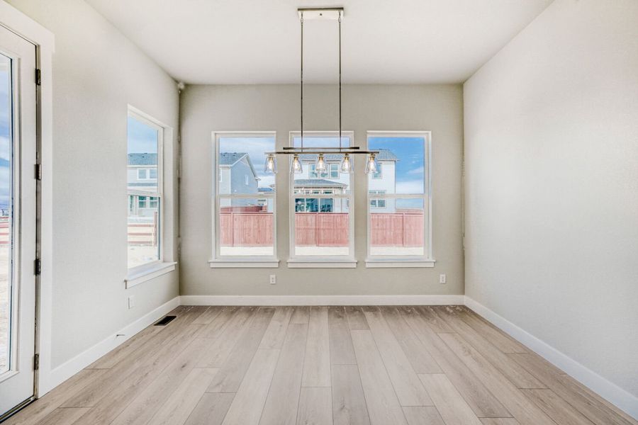 Spacious, unfurnished interior of a new home in RainDance, Windsor (Image 30).