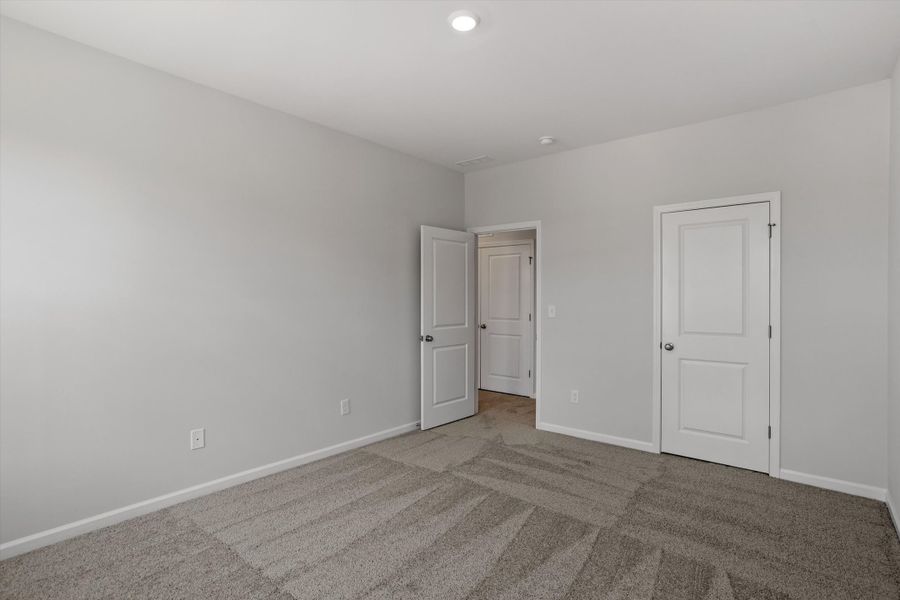 Spacious, unfurnished interior of a new home in Sweetbrier, Durham (Image 28).