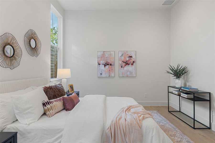 Bedroom featuring light hardwood / wood-style floors