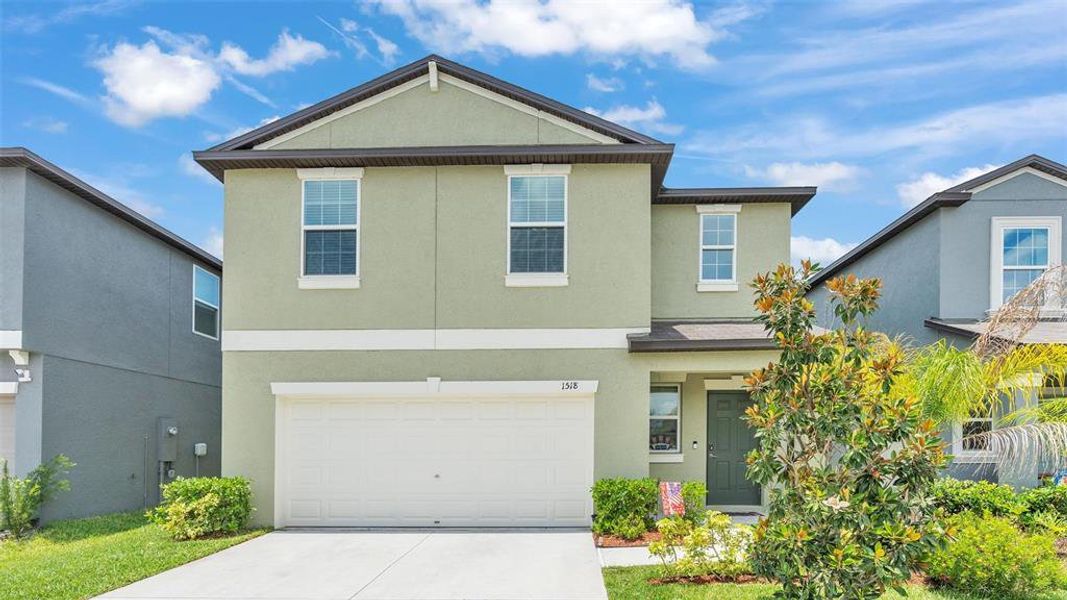 Front exterior of a new home in , Lakeland, FL, highlighting curb appeal (Image 1). Front exterior of a new home in , Lakeland, FL, highlighting curb appeal (Image 1).