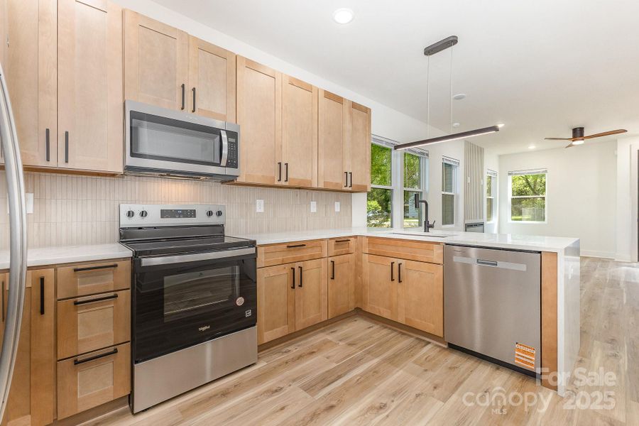 Furnished interior view inside a new home in , Concord (Image 5).