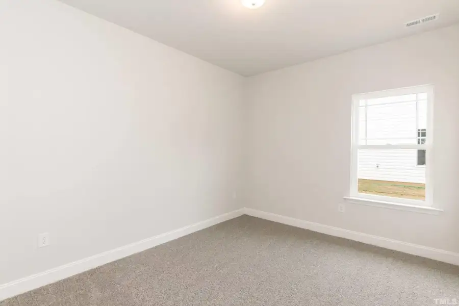 Spacious, unfurnished interior of a new home in East Lake, Leland (Image 21).