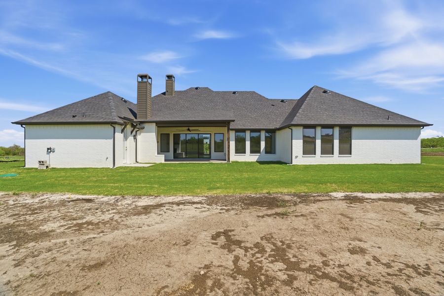 Front exterior of a new home in Summit Ranch, Aledo, TX, highlighting curb appeal (Image 26).