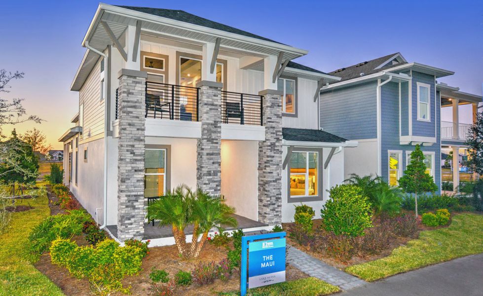 Front exterior of a new home in Laureate Park, Orlando, FL, highlighting curb appeal (Image 2). Front exterior of a new home in Laureate Park, Orlando, FL, highlighting curb appeal (Image 2).