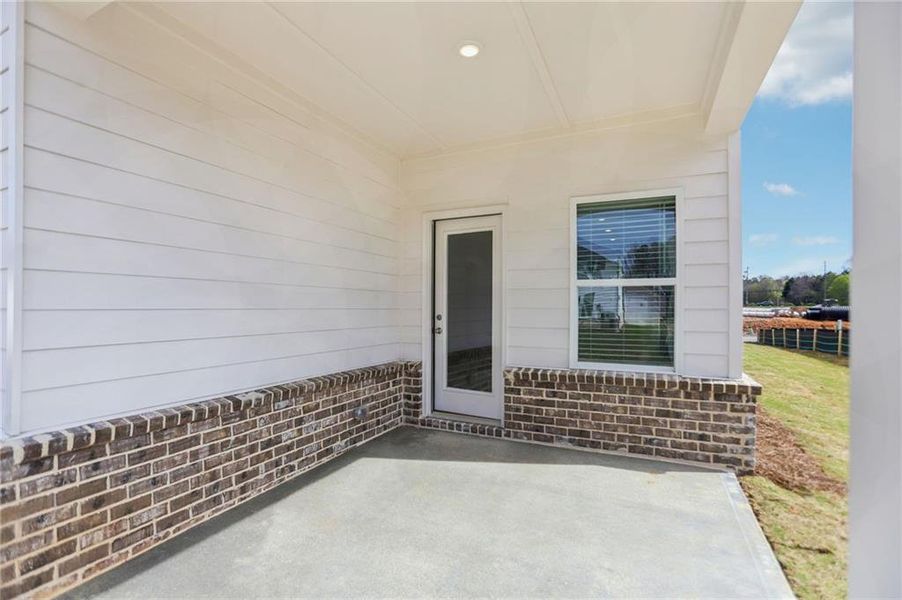 Exterior details and patio area of a home in Westmont Preserve, Powder Springs (Image 3).