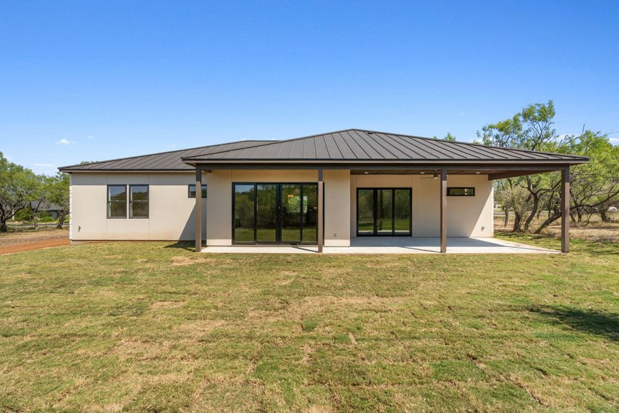 Front exterior of a new home in , Horseshoe Bay, TX, highlighting curb appeal (Image 1). Front exterior of a new home in , Horseshoe Bay, TX, highlighting curb appeal (Image 1).
