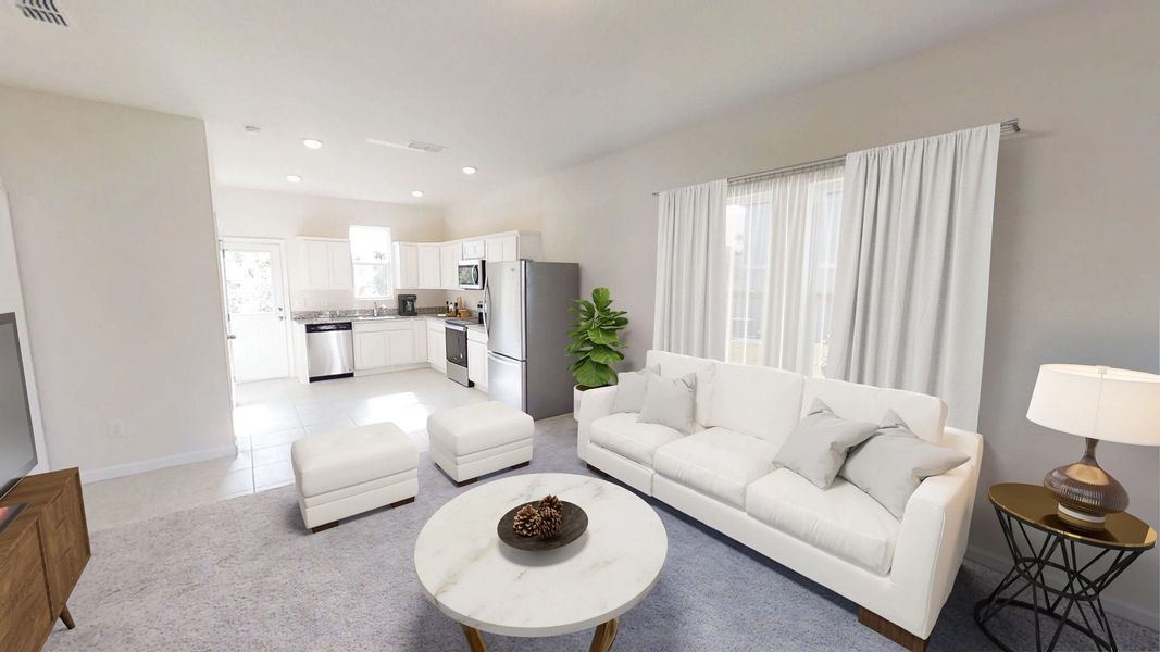 Representative furnished interior of a home built from the Atlantis by Starlight Homes in Pelham Square, Deland (Image 4).